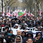 Thousands protest in Paris over death of migrant worker