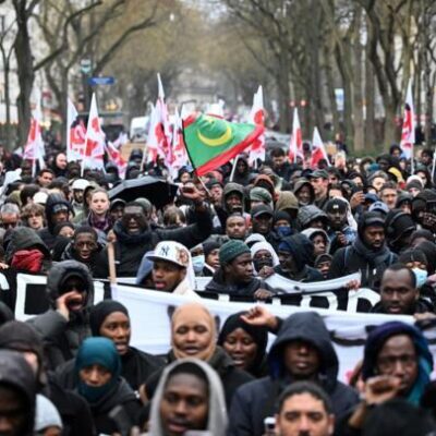 Thousands protest in Paris over death of migrant worker