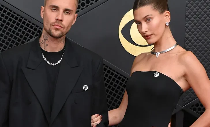 Singer Justin and wife Hailey Bieber wear ‘ICE Out’ pins to Grammys