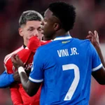 FIFA president calls for footballers who cover their mouths during confrontations to be sent off after Vinicius Jr racism row