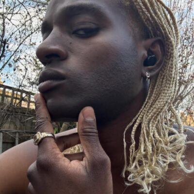 Anambra first son, Ozonna Soludo shows off new look as he transitions from afro hair to braids (photos)