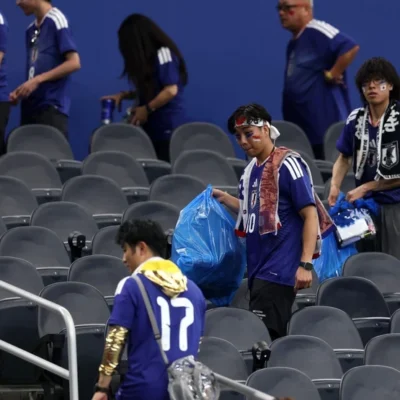 Japanese Fans Praised for Cleaning Stadium After Match {VIDEO}