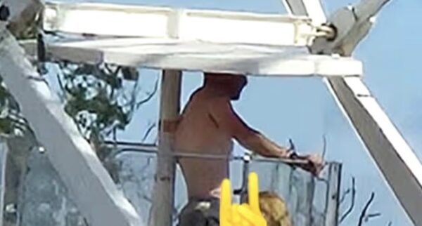 Couple caught ‘having s£x’ on Ferris wheel in front of stunned festival-goers {VIDEO}