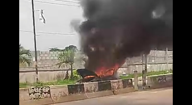 BREAKING : Parked Car Catches Fire at Olowora Junction in Lagos {VIDEO}