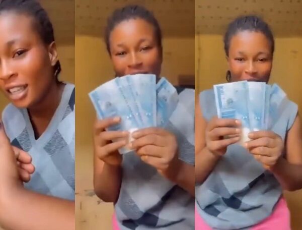 “APC for life, ₦15,000 per vote” — Woman displays fresh naira notes allegedly received from APC members. {VIDEO}